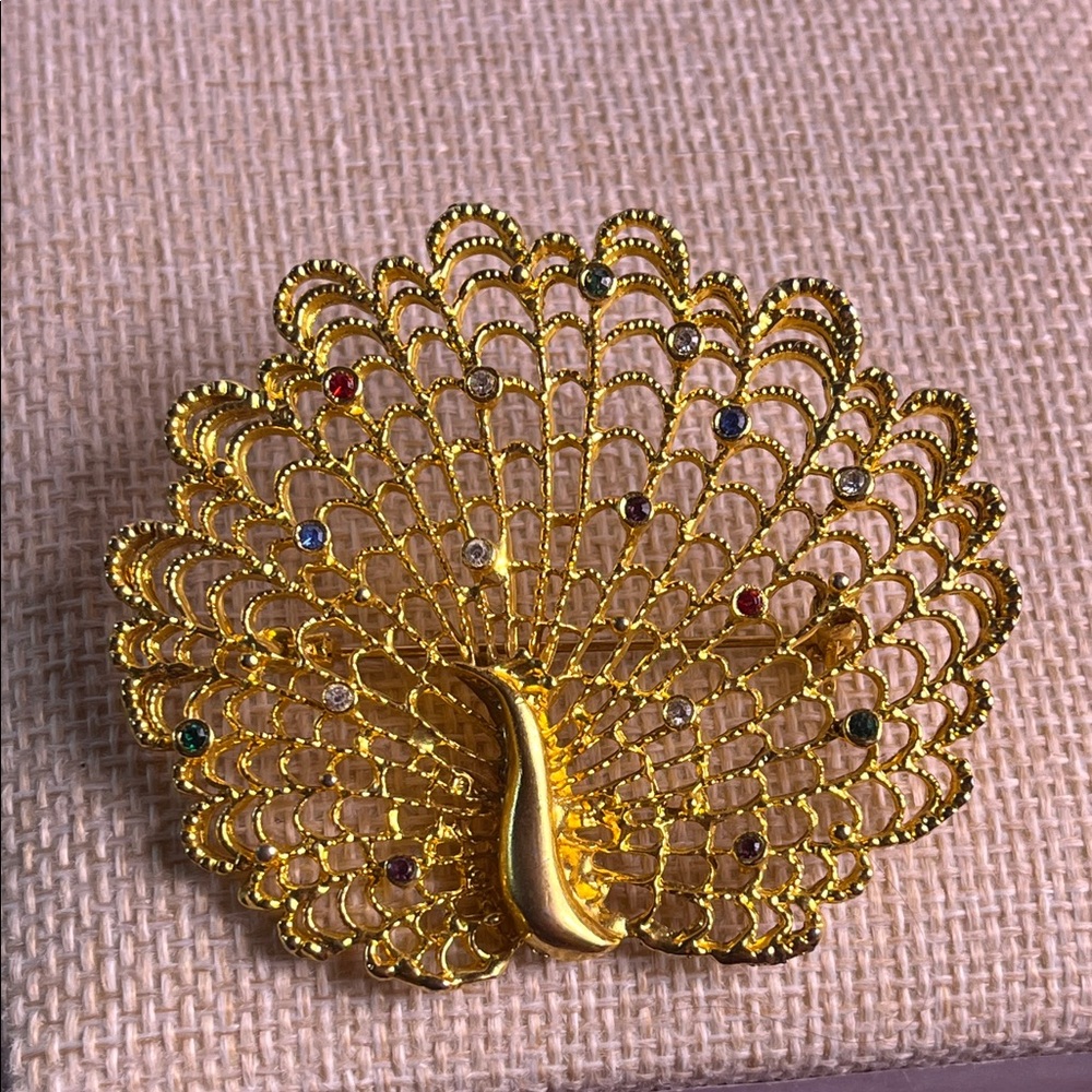 Gold Peacock Fan Brooch with Multicolor Accents